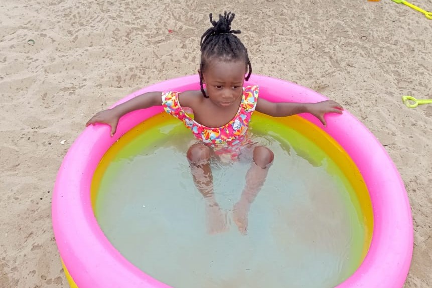 child in pool