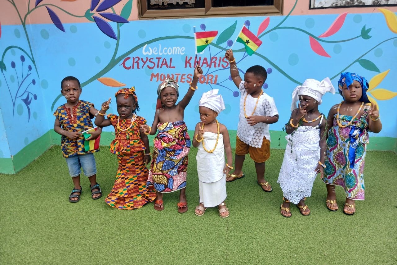 female student with a trophy and medal